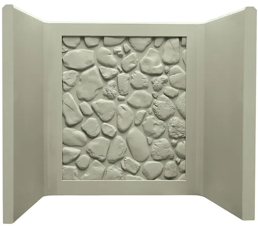 Precast concrete window well with river-rock texture